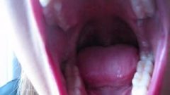 Woman Closeup Mouth And Cute Teeth