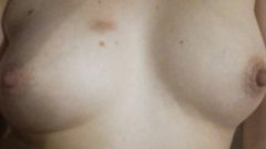 Nubile Playing With Her Sweet Breasts Closeup