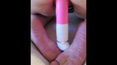 Close Up Housewife Destroys Pink Rubber Toy