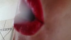 Red Lips Close Up Smokes Cigarette